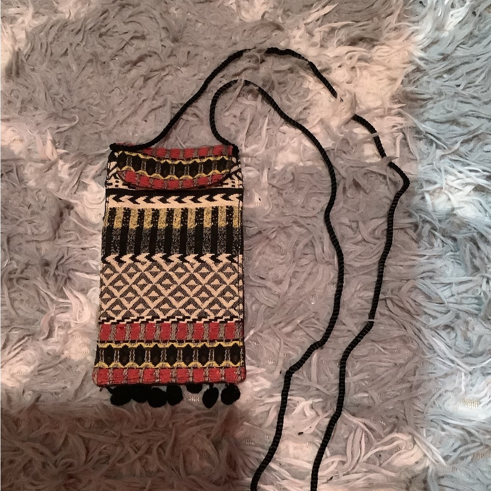 Passport holder fabric bag with a long stripe.